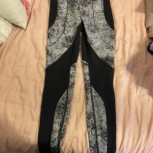 lululemon size 4 black printed leggings, great for workouts and a fun statement